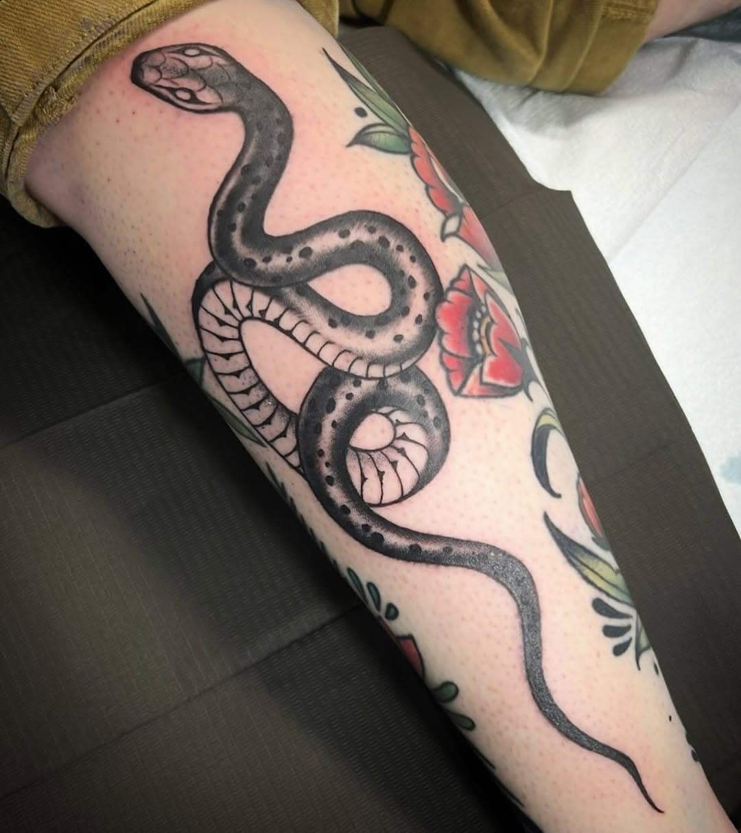 Coiled Serpent with Floral Accents
