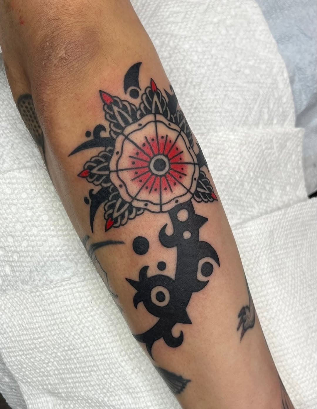 Detailed floral mandala and abstract shape