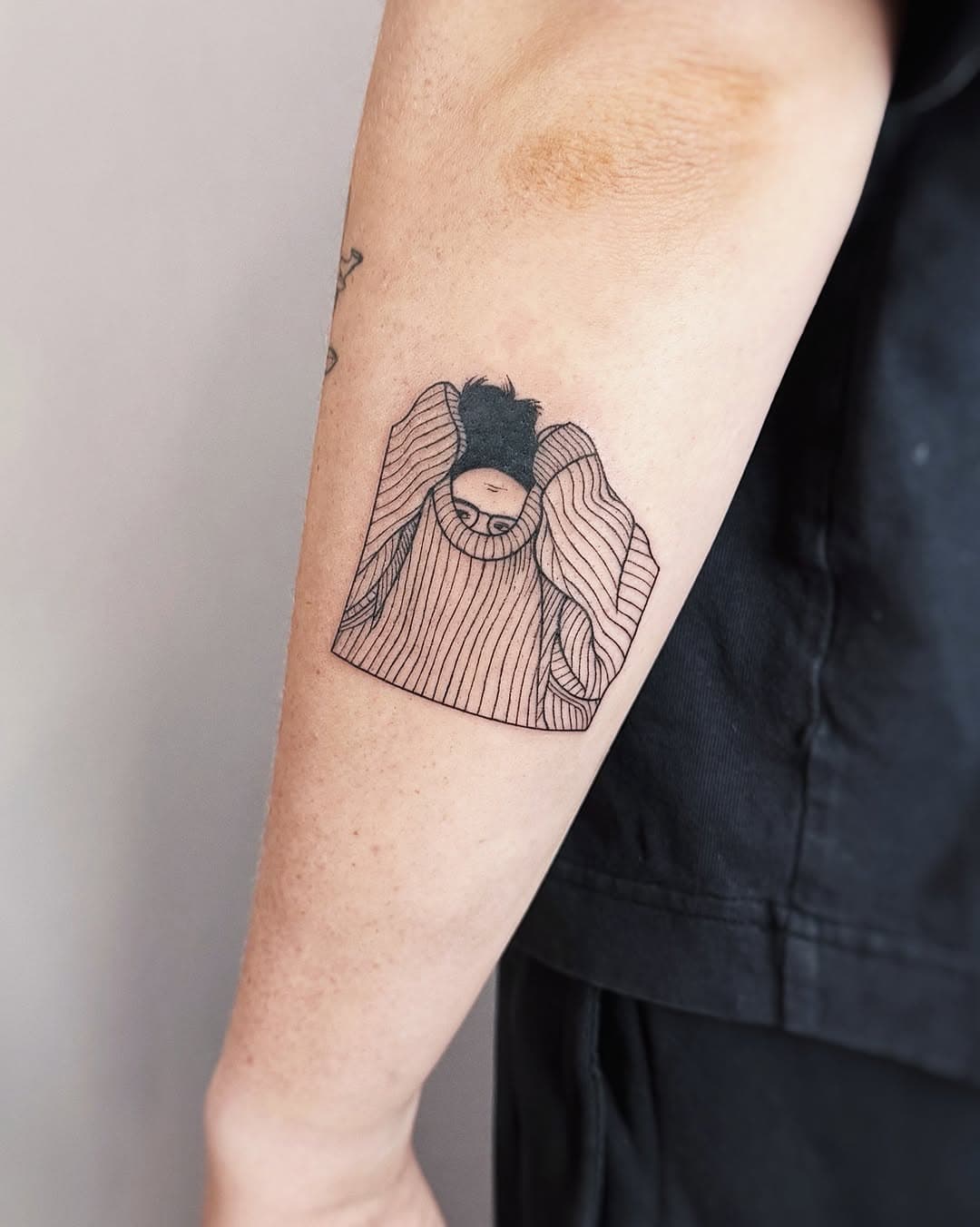 Figure in striped sweater