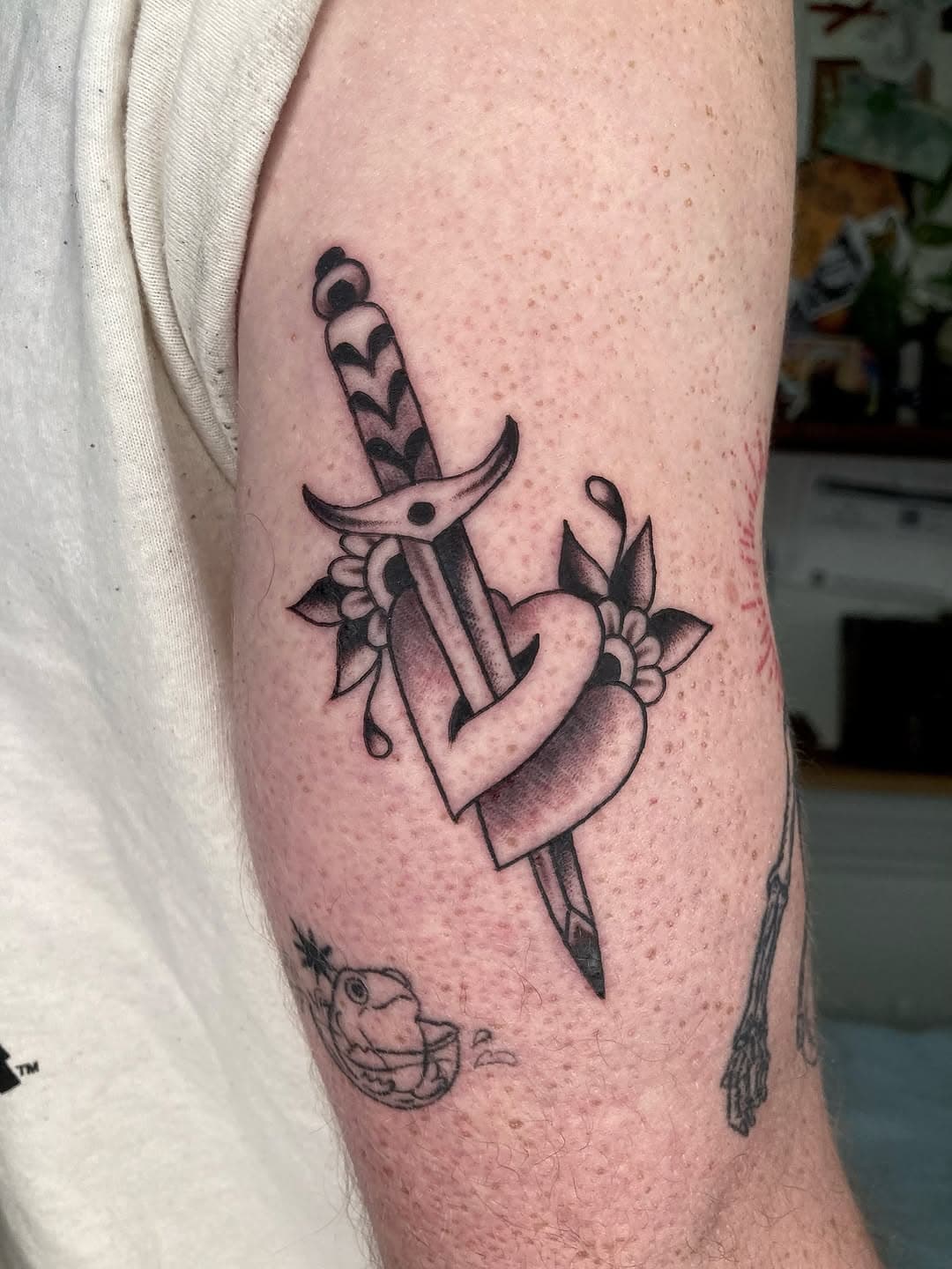 Pierced Heart with Floral Adornments