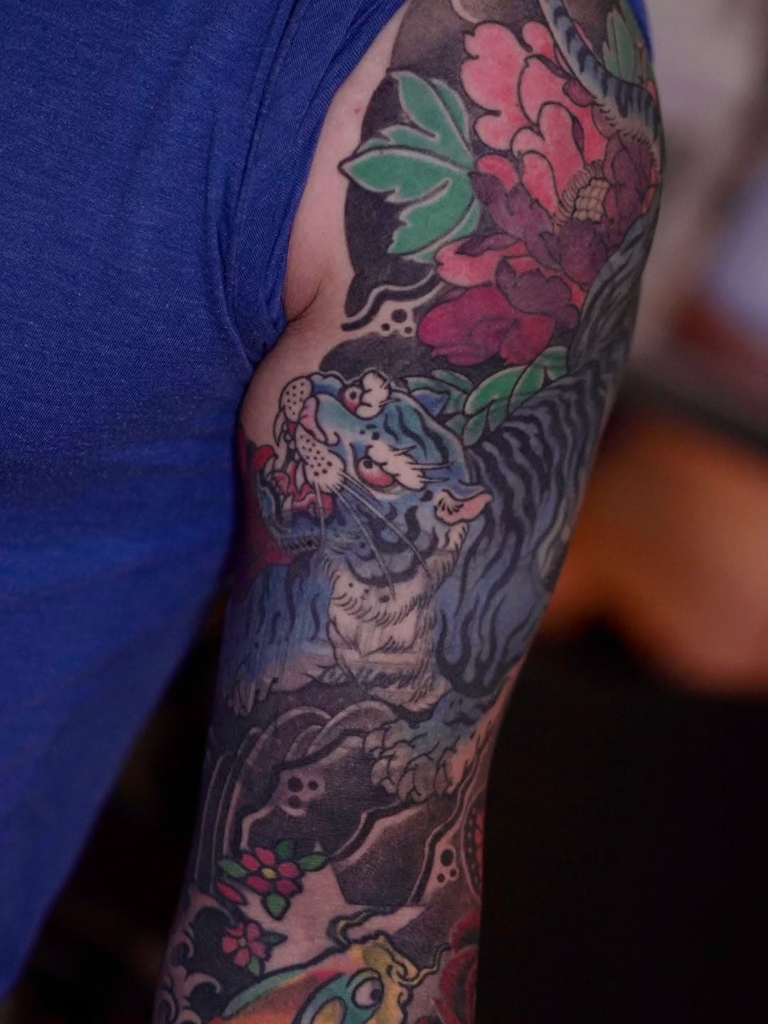 Vibrant sleeve with tiger and peony