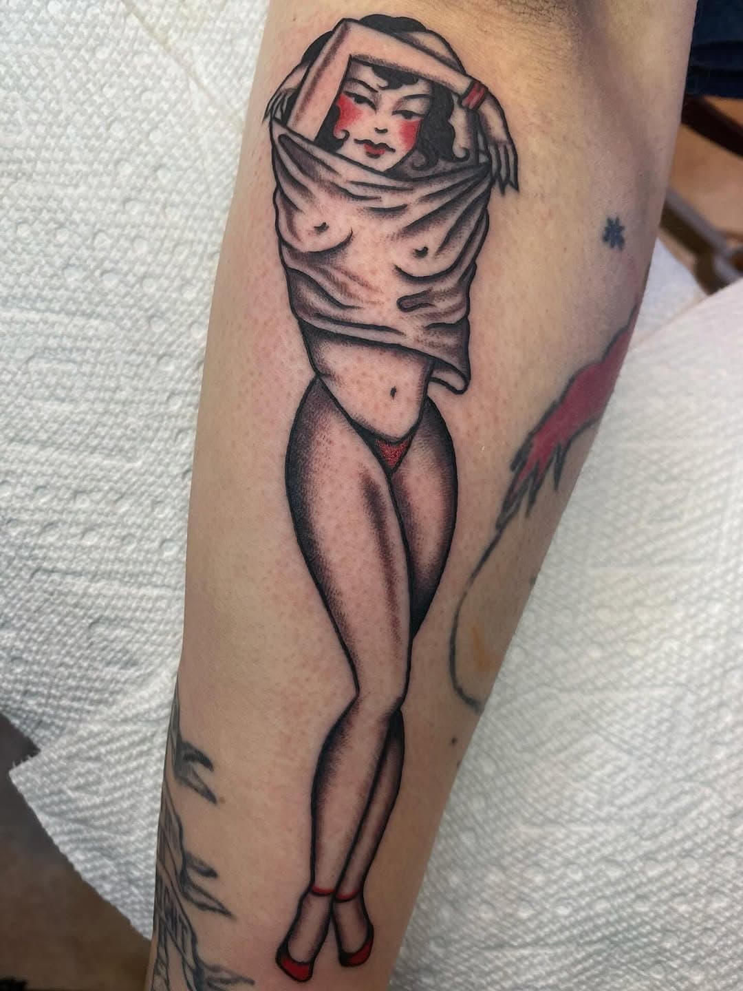 Pin-up woman on an arm