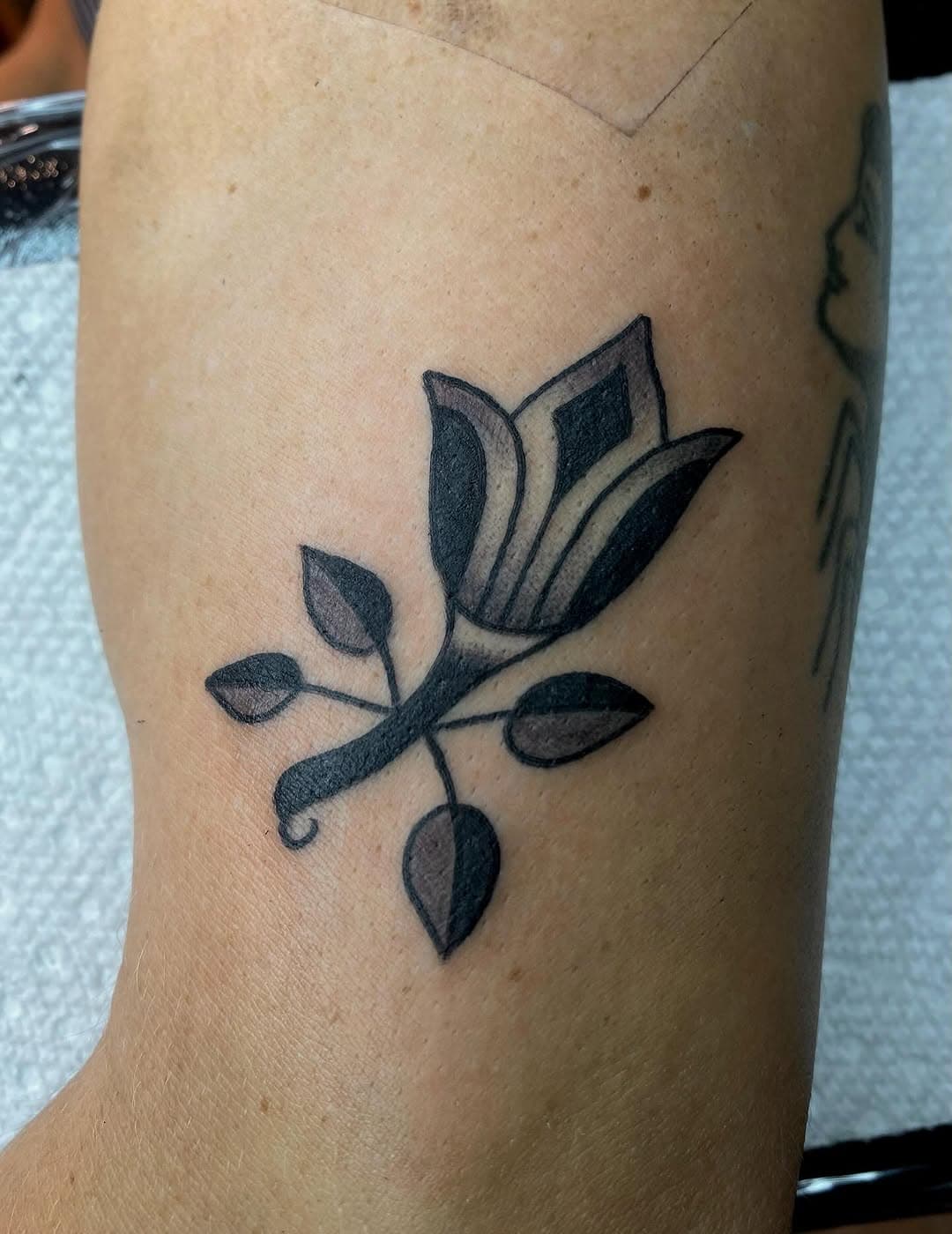 Stylized blossom with foliage