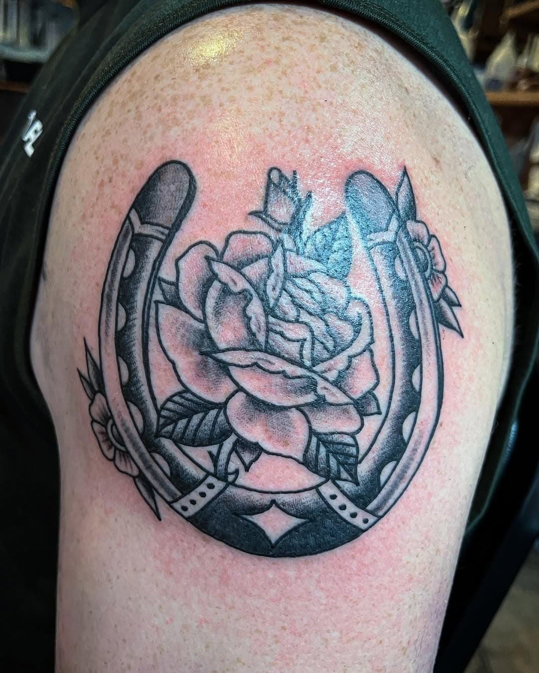 Horseshoe and rose floral