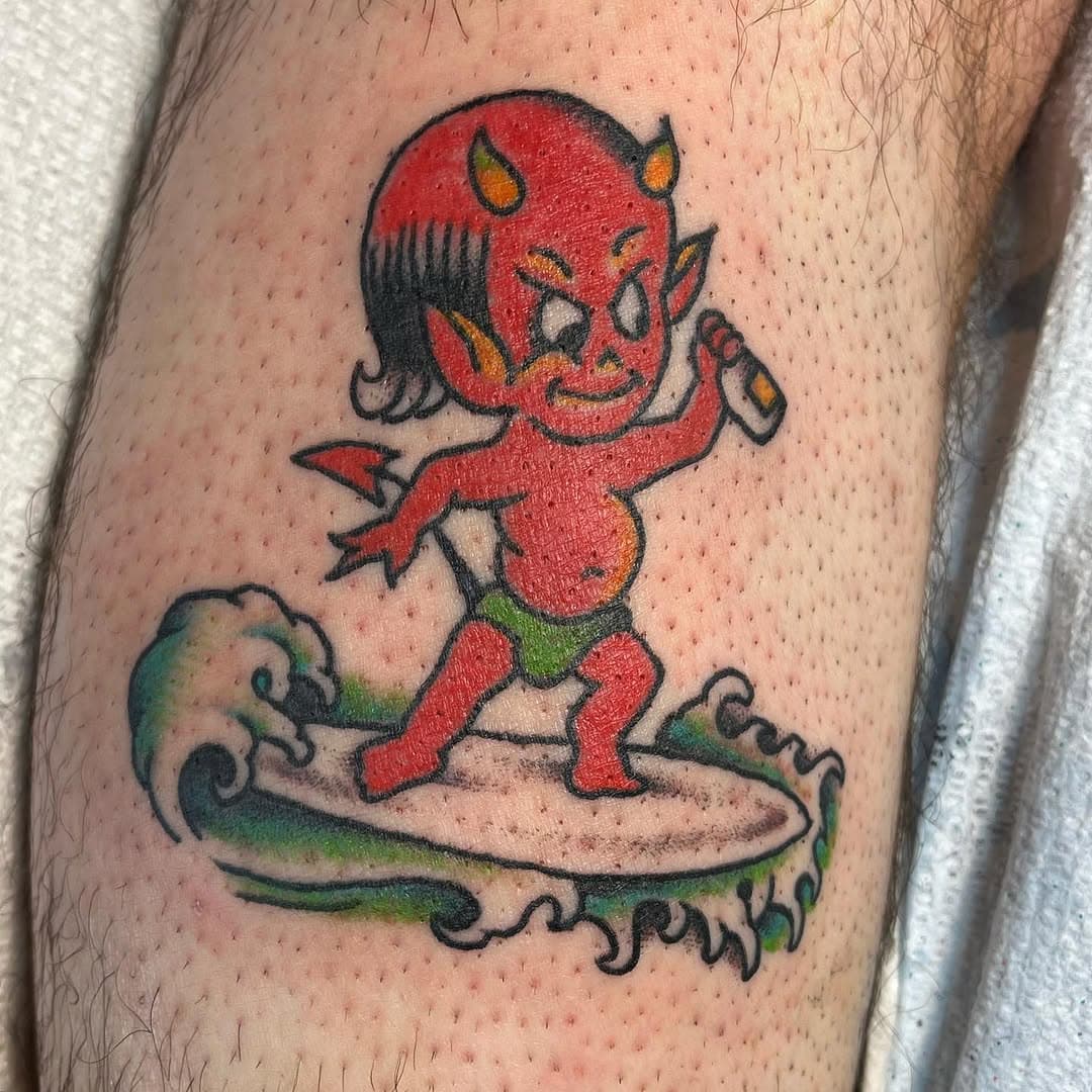 Surfing Imp Holding a Beverage