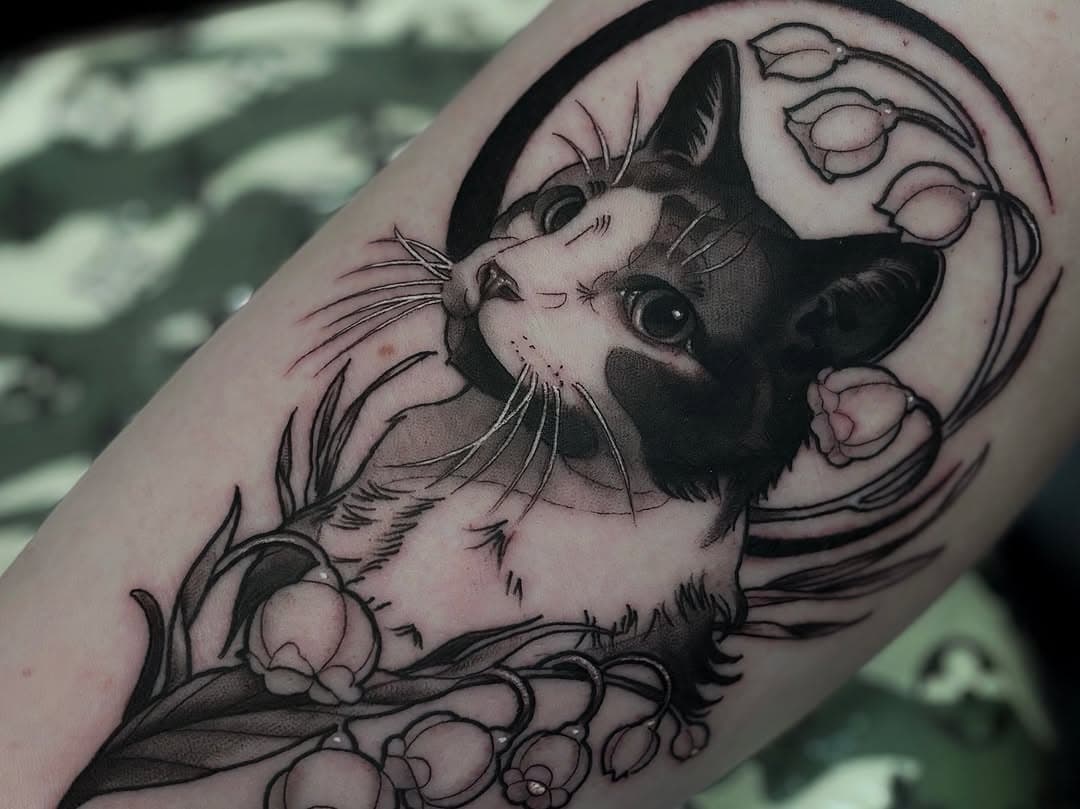 Feline companion with blossoms