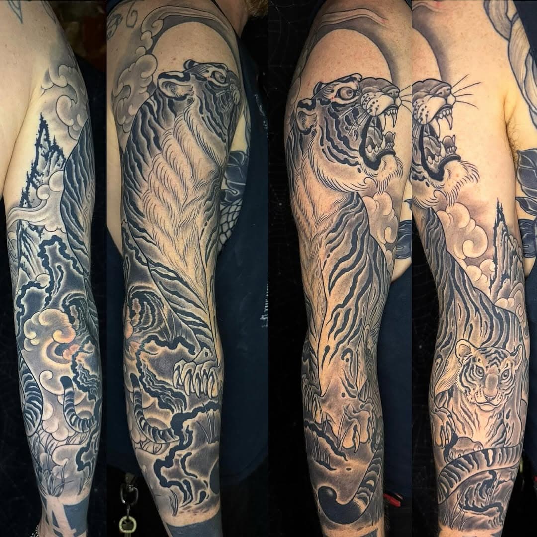 Roaring Tiger and Cub Arm