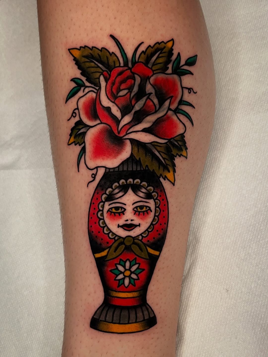 Matryoshka doll with a blooming rose