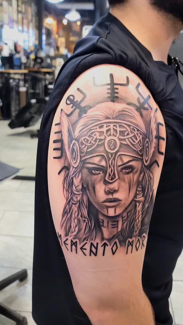 Viking warrior woman with runic symbols