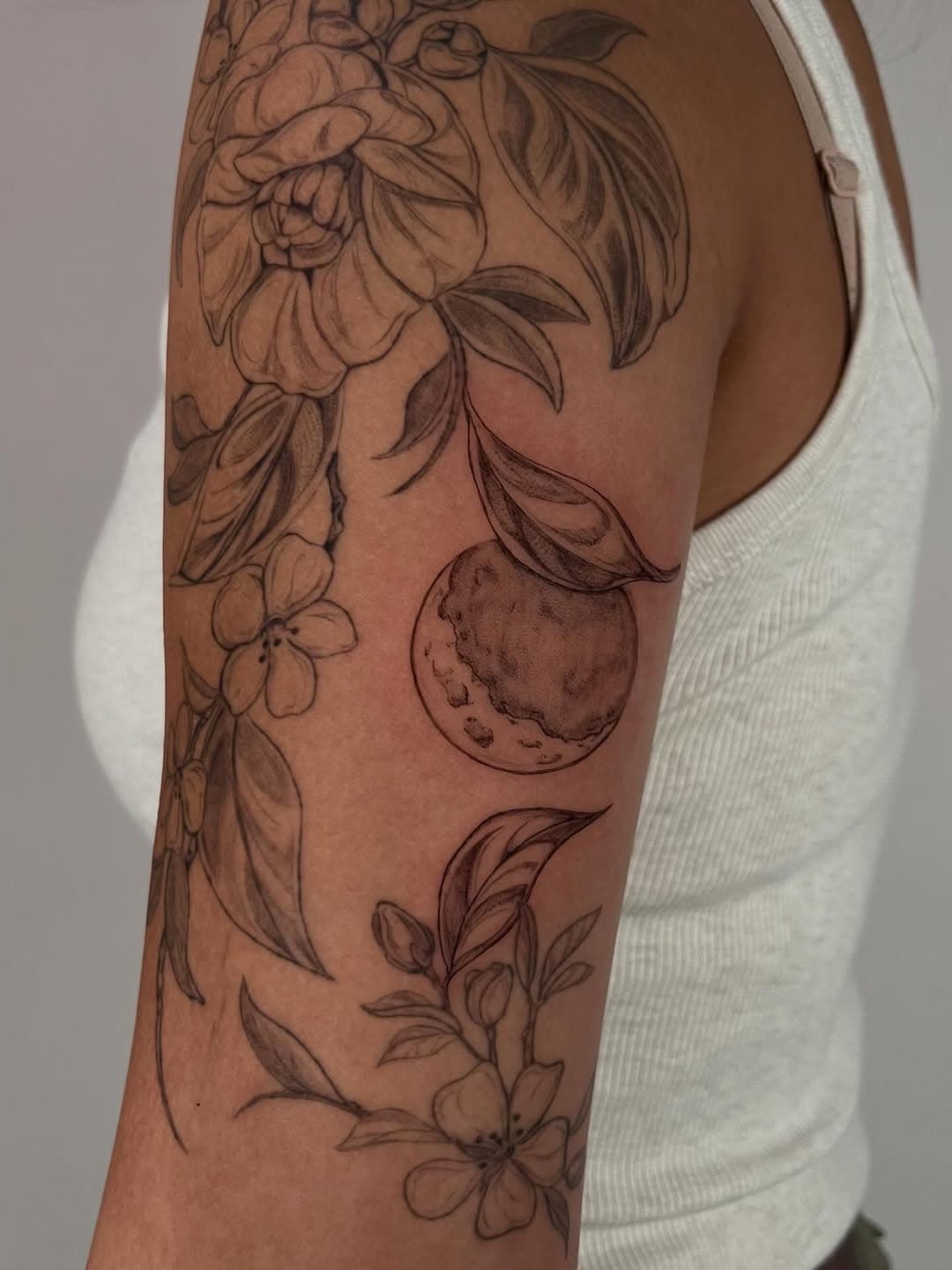 Floral and lunar arm adornment