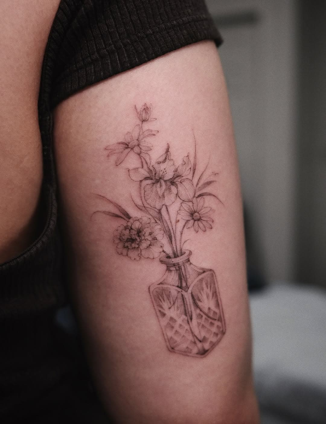 Floral arrangement in cut glass vase