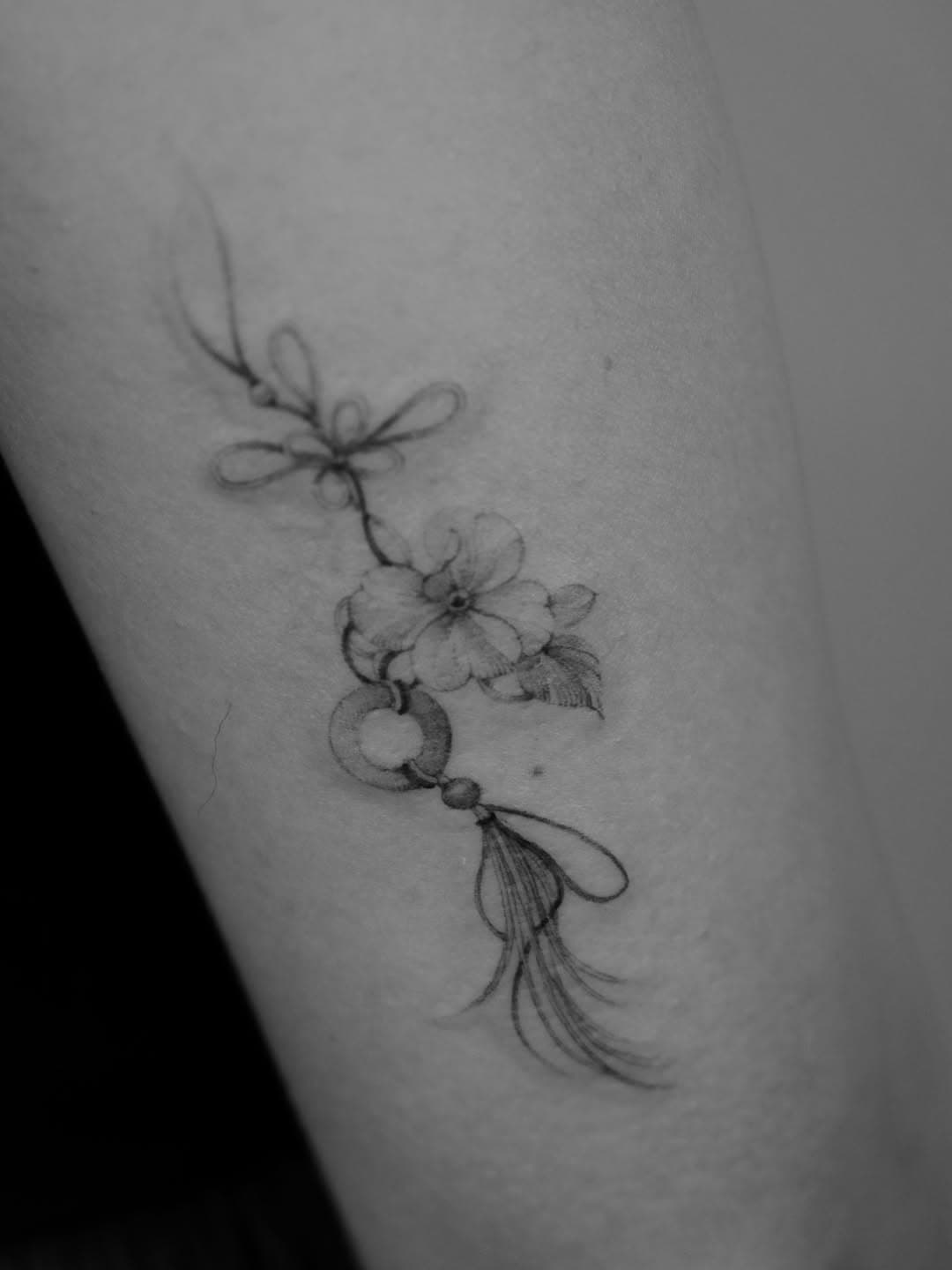 Delicate floral charm