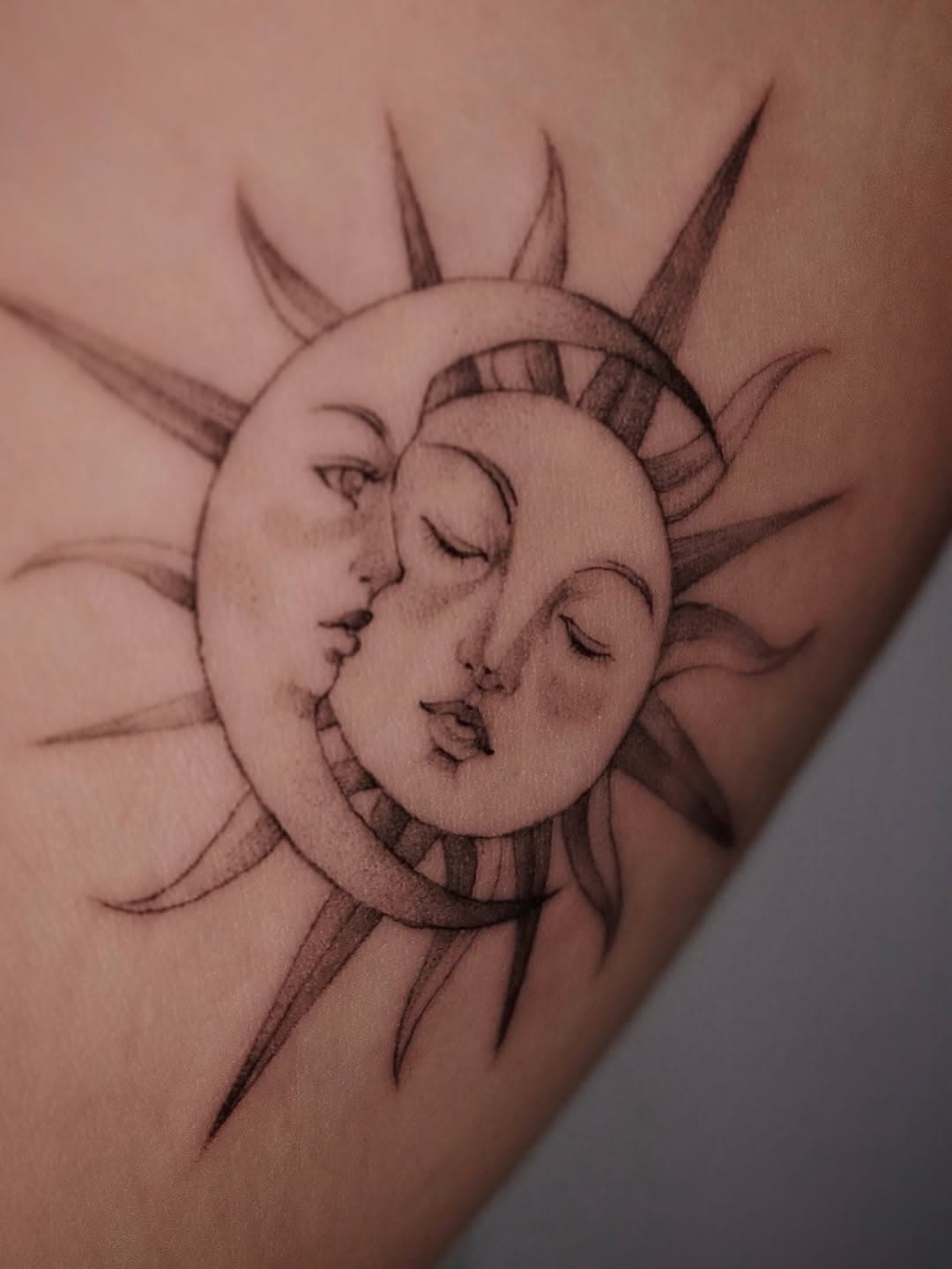 Celestial sun and moon faces