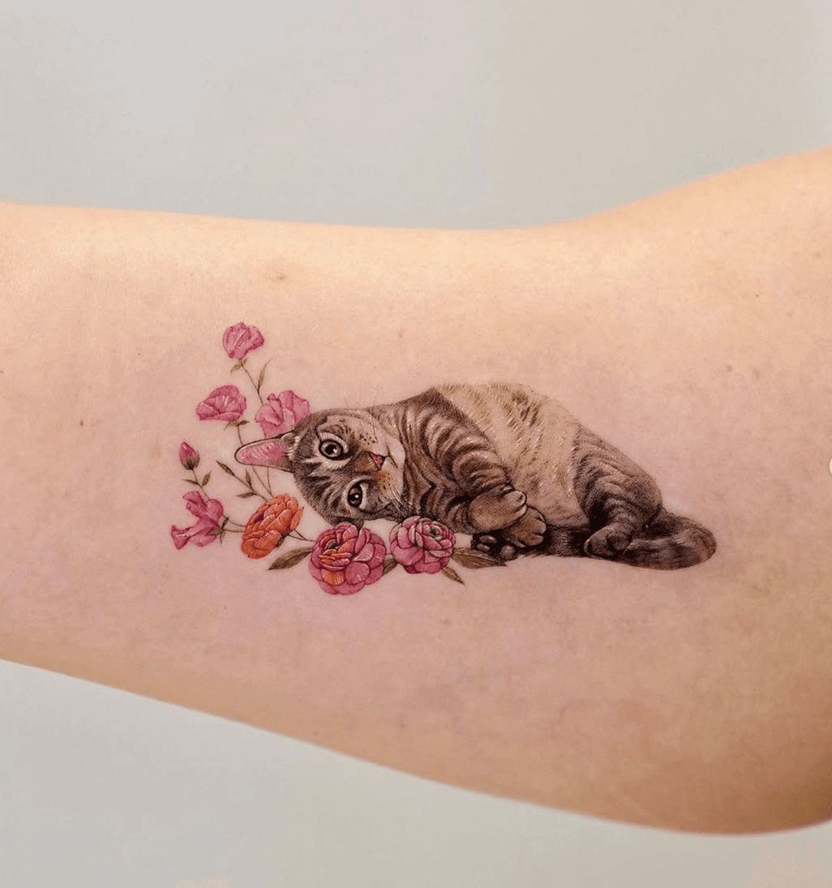 Playful Tabby Surrounded by Blossoms