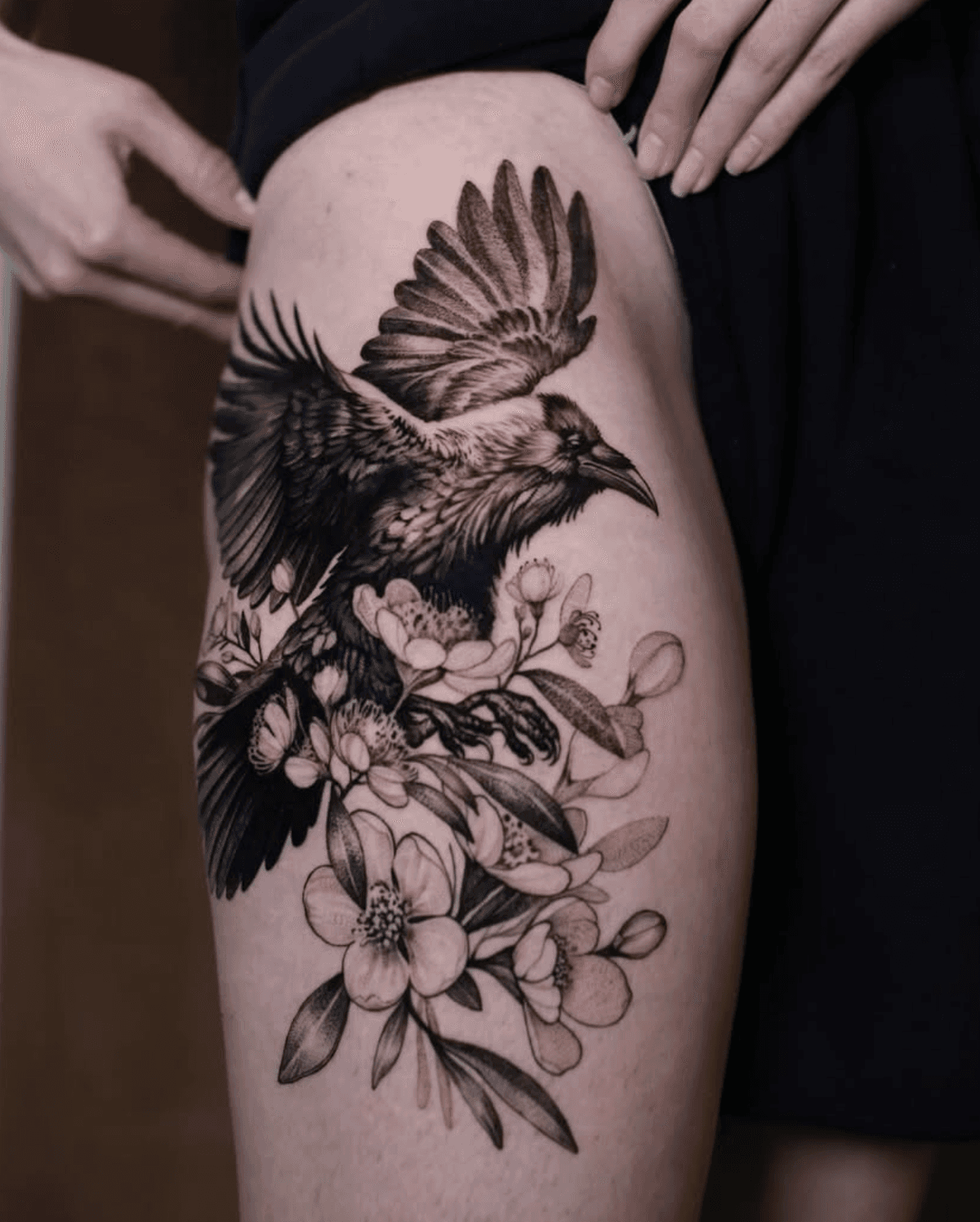 Flying bird with floral elements