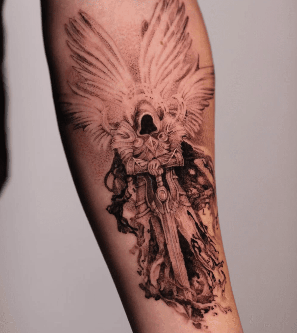 Armored figure with wings