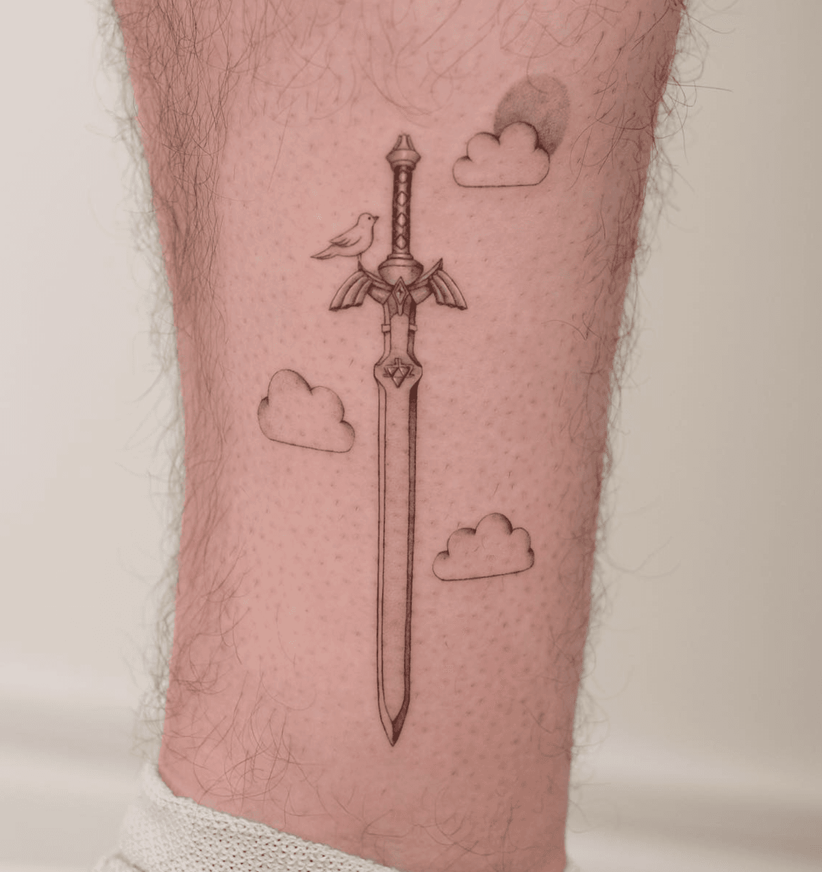 Sword with Bird and Clouds