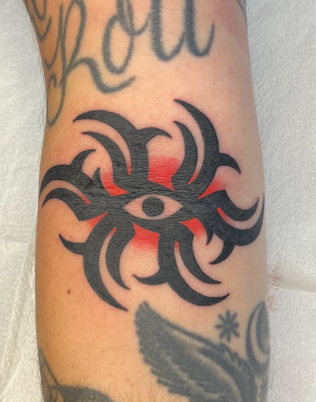 Tribal eye with red glow