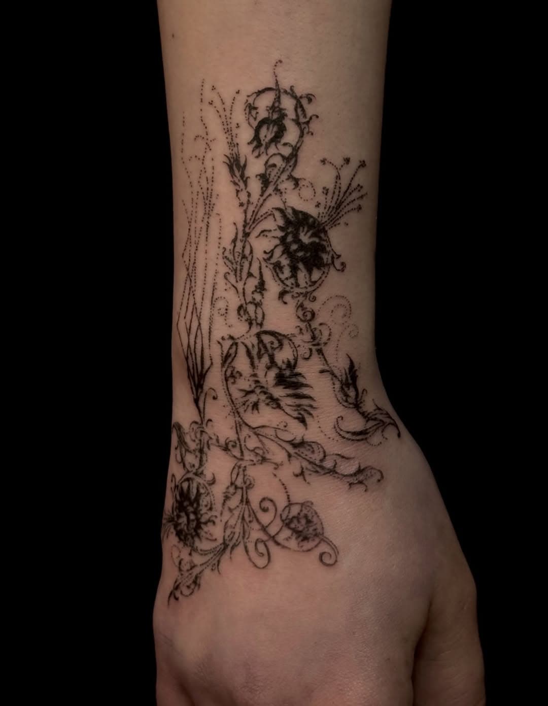 Intricate botanical pattern on skin