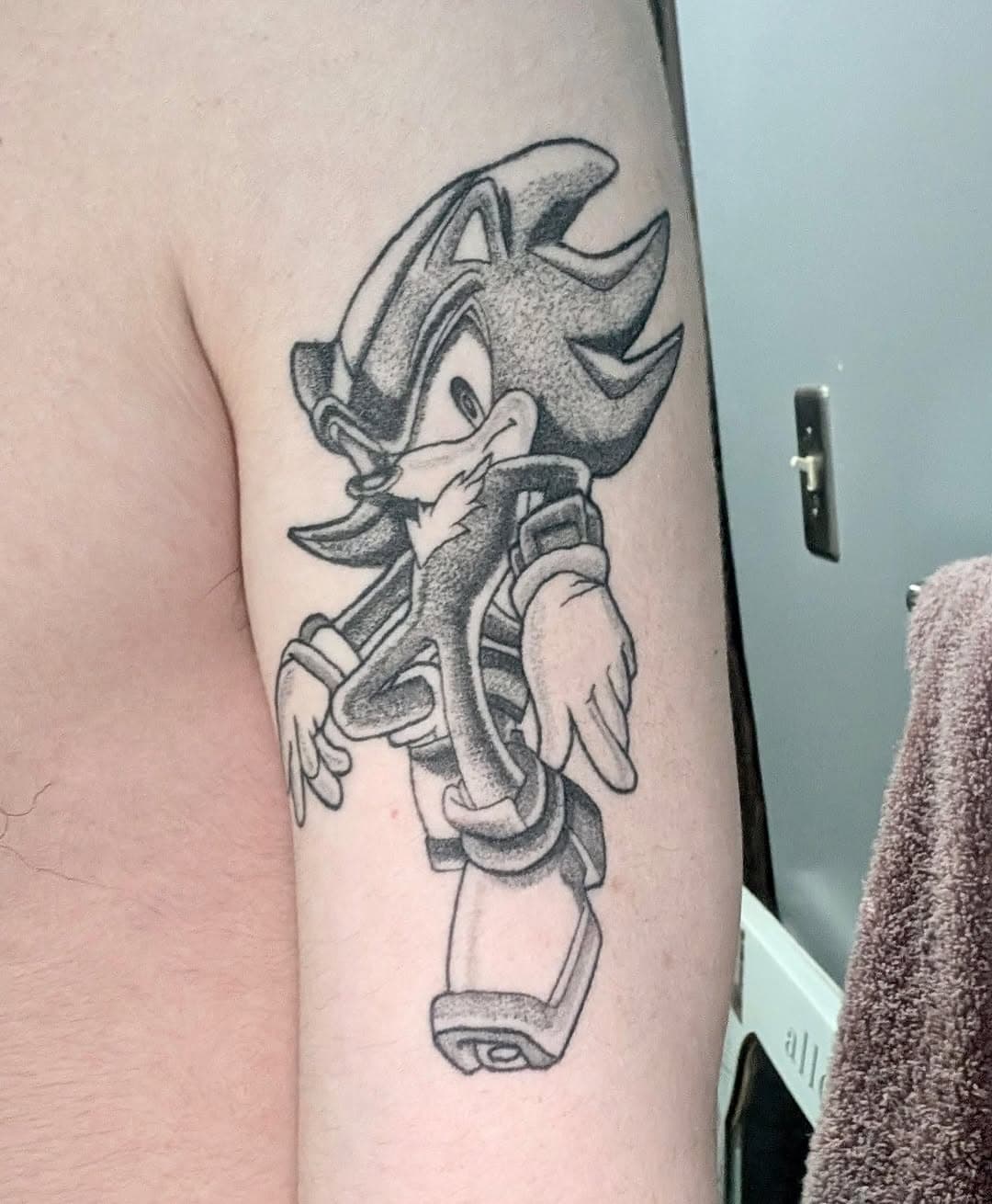 Shadow character on arm