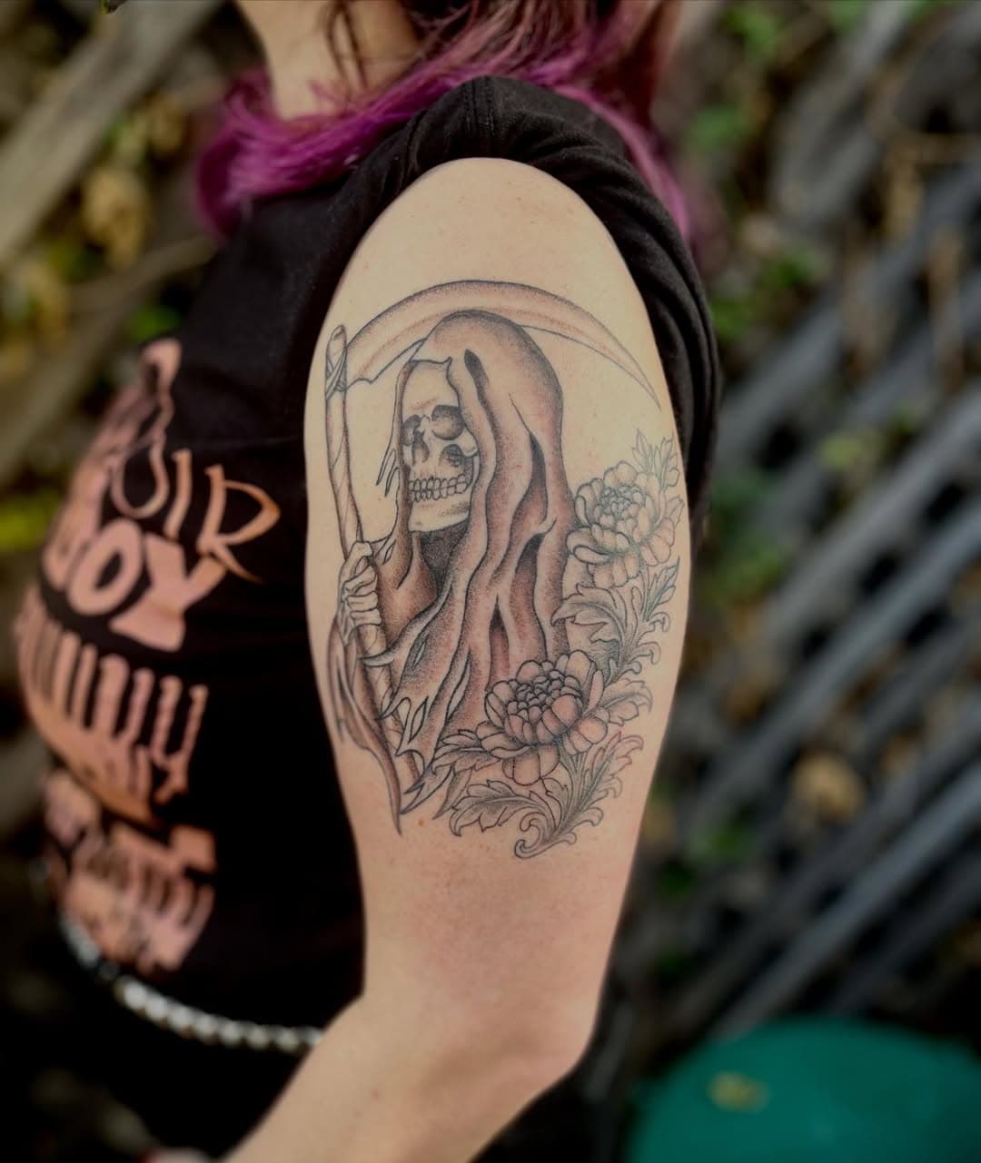 Hooded Skeletal Figure with Scythe