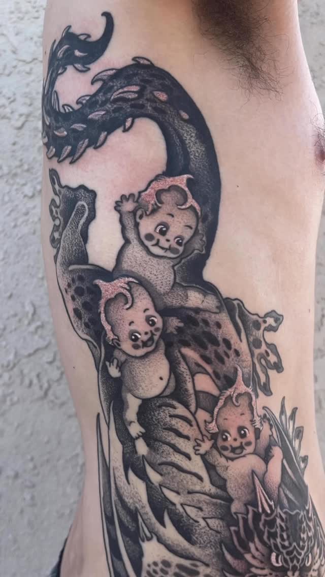 Smiling babies on mythical beast