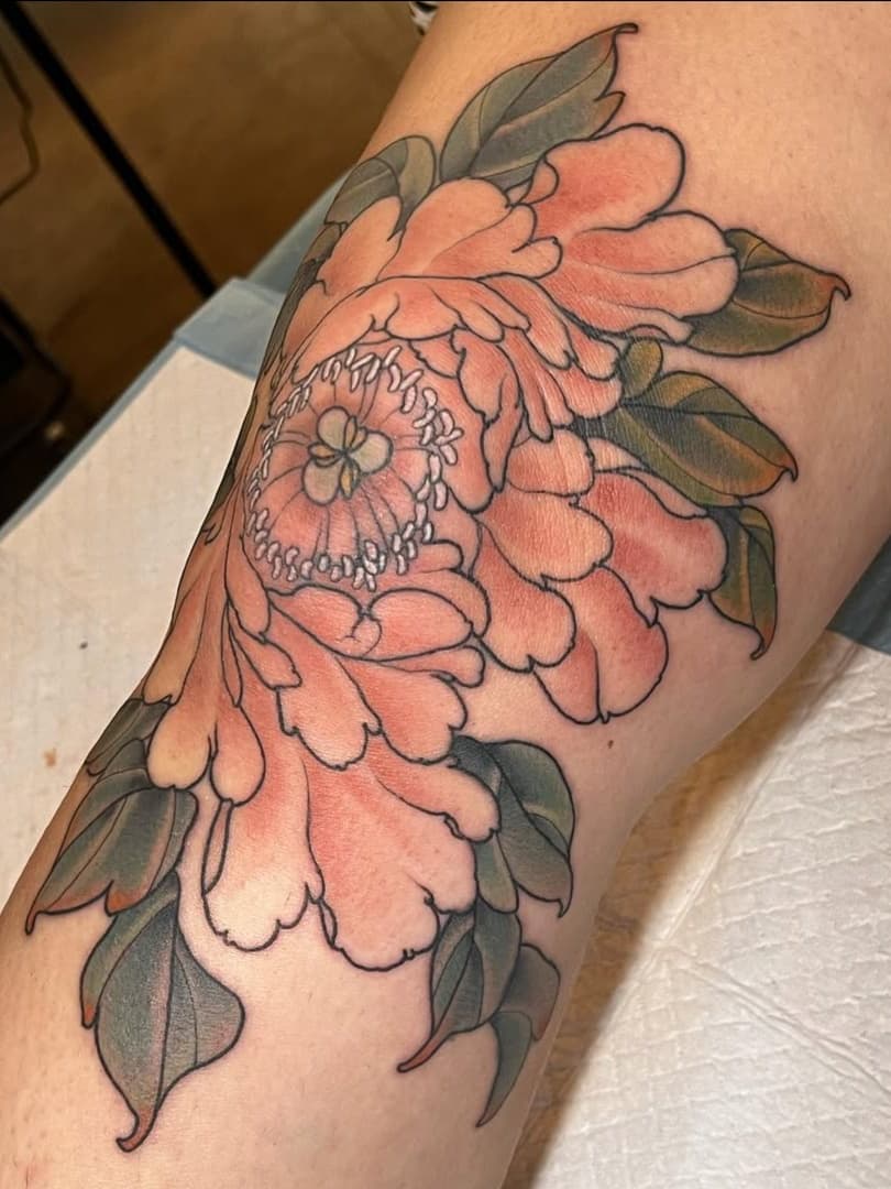 Peony bloom on skin