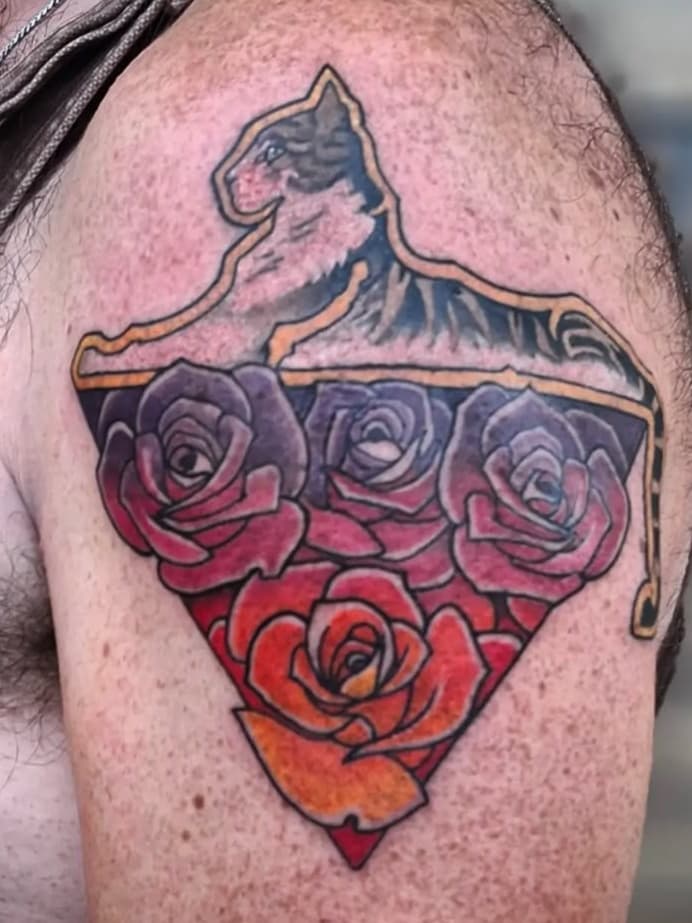 Feline and floral crest