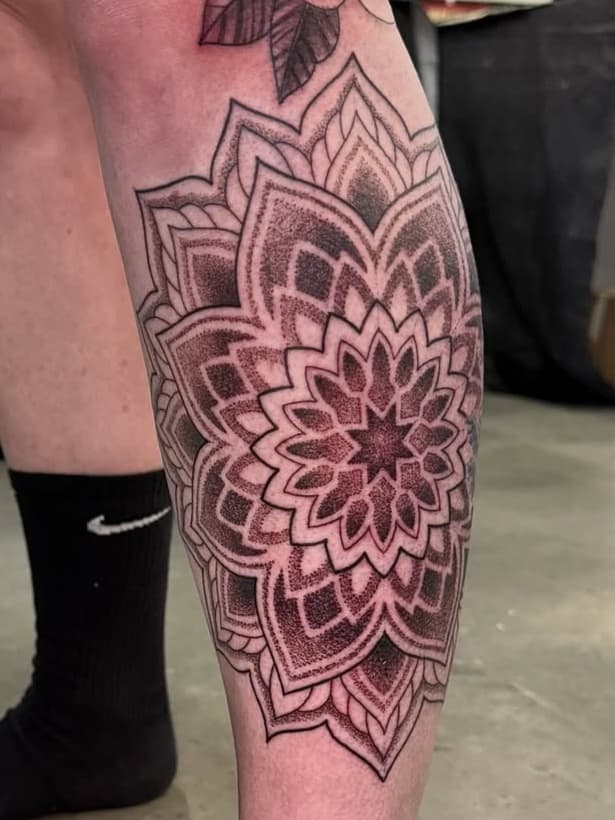 Detailed mandala and peony on leg