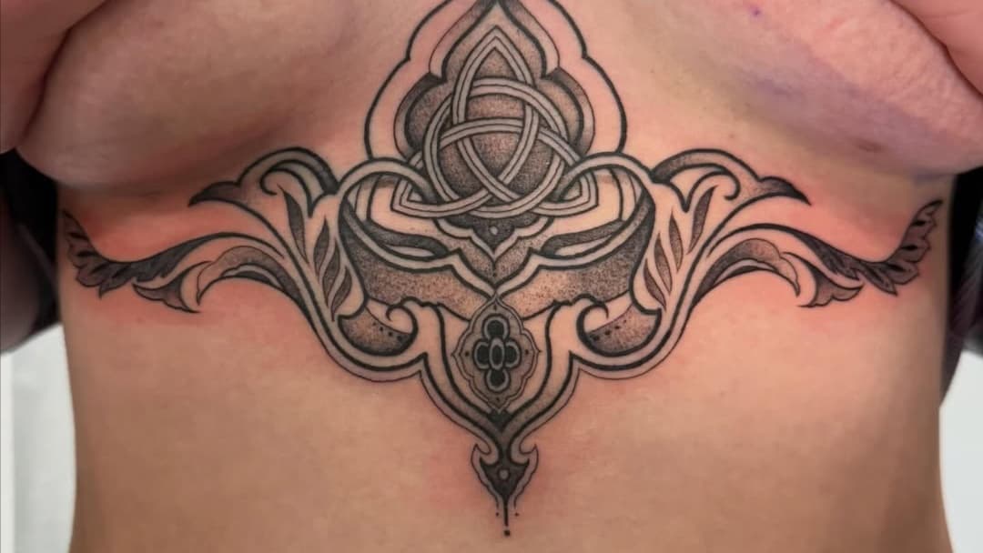Intricate Celtic knot and ornamental chest piece