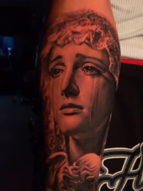 Crying Woman and Blindfolded Angel