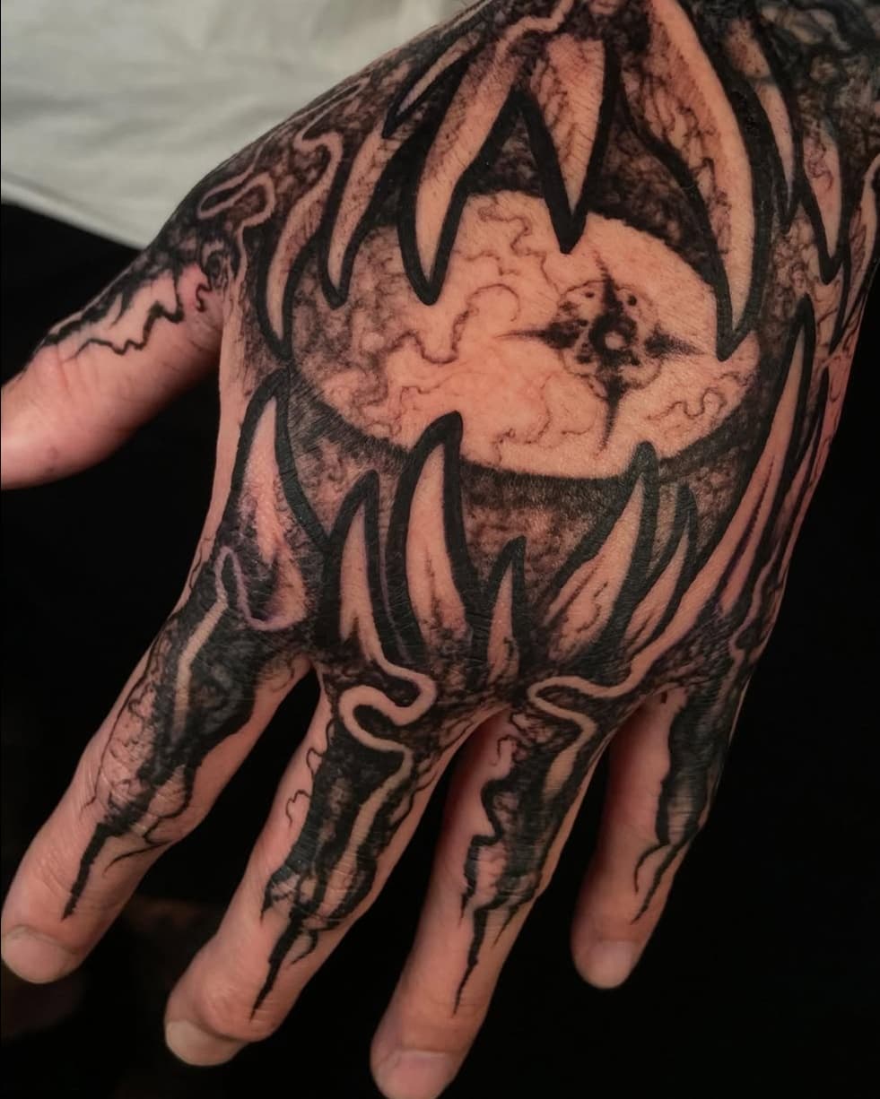 Abstract Mouth and Tendrils on Hand