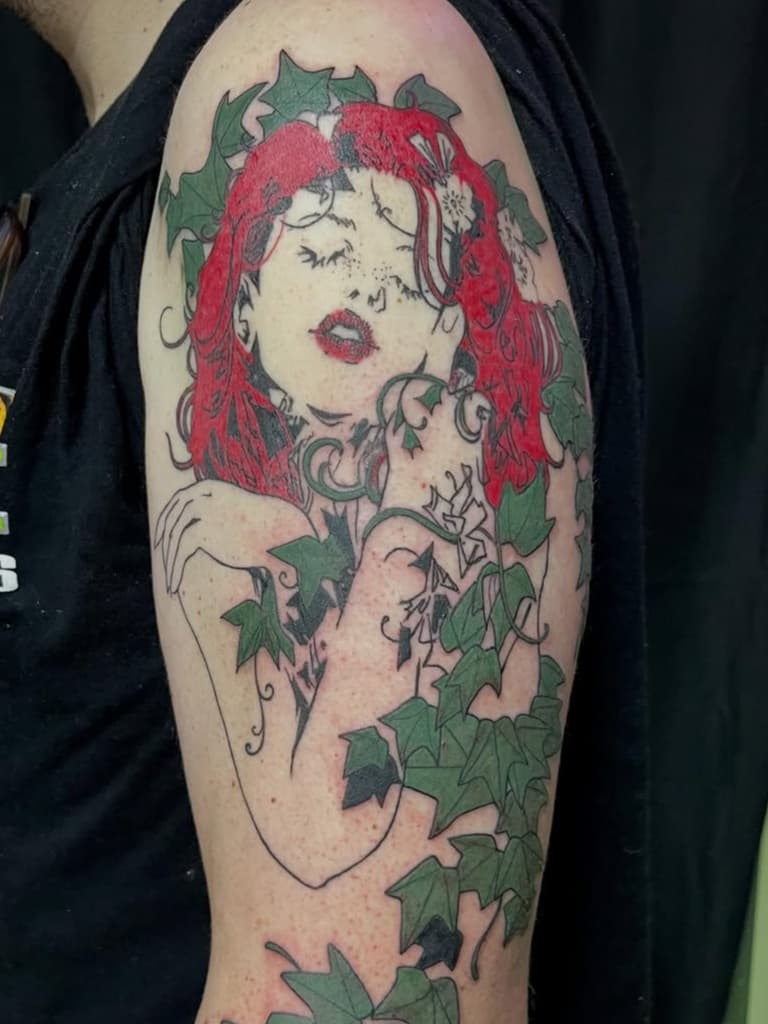 Red-haired woman with vines