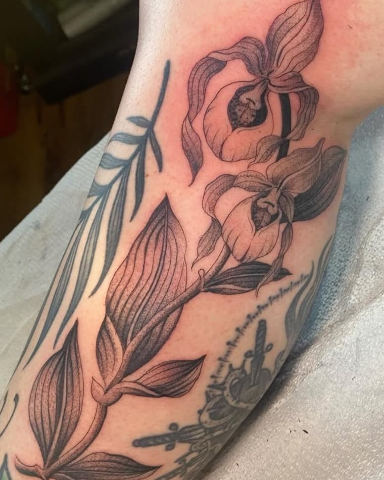 Botanical orchid and leaf arrangement