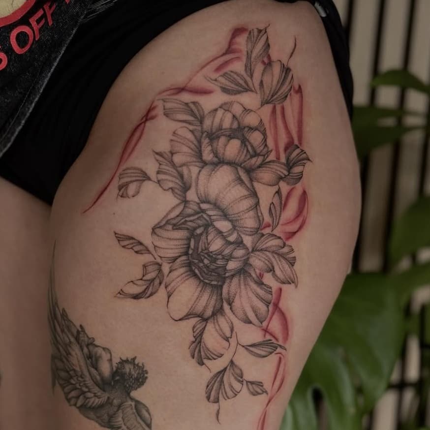 Floral arrangement with cherub