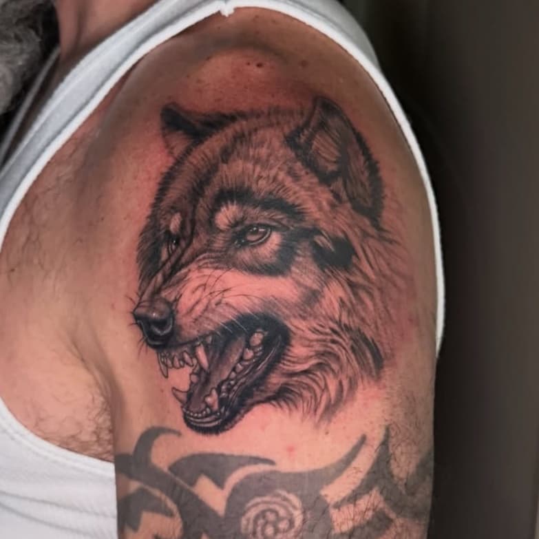 Snarling Wolf Head and Tribal Arm