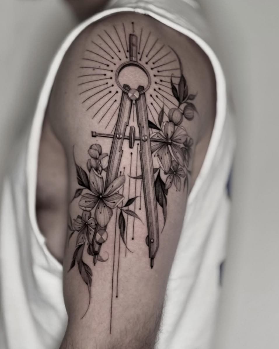 Geometric compass and blooming flowers