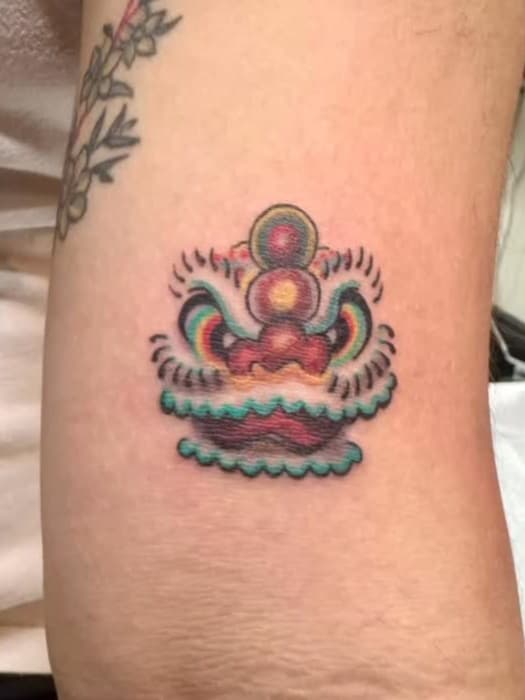 Colorful lion head amulet